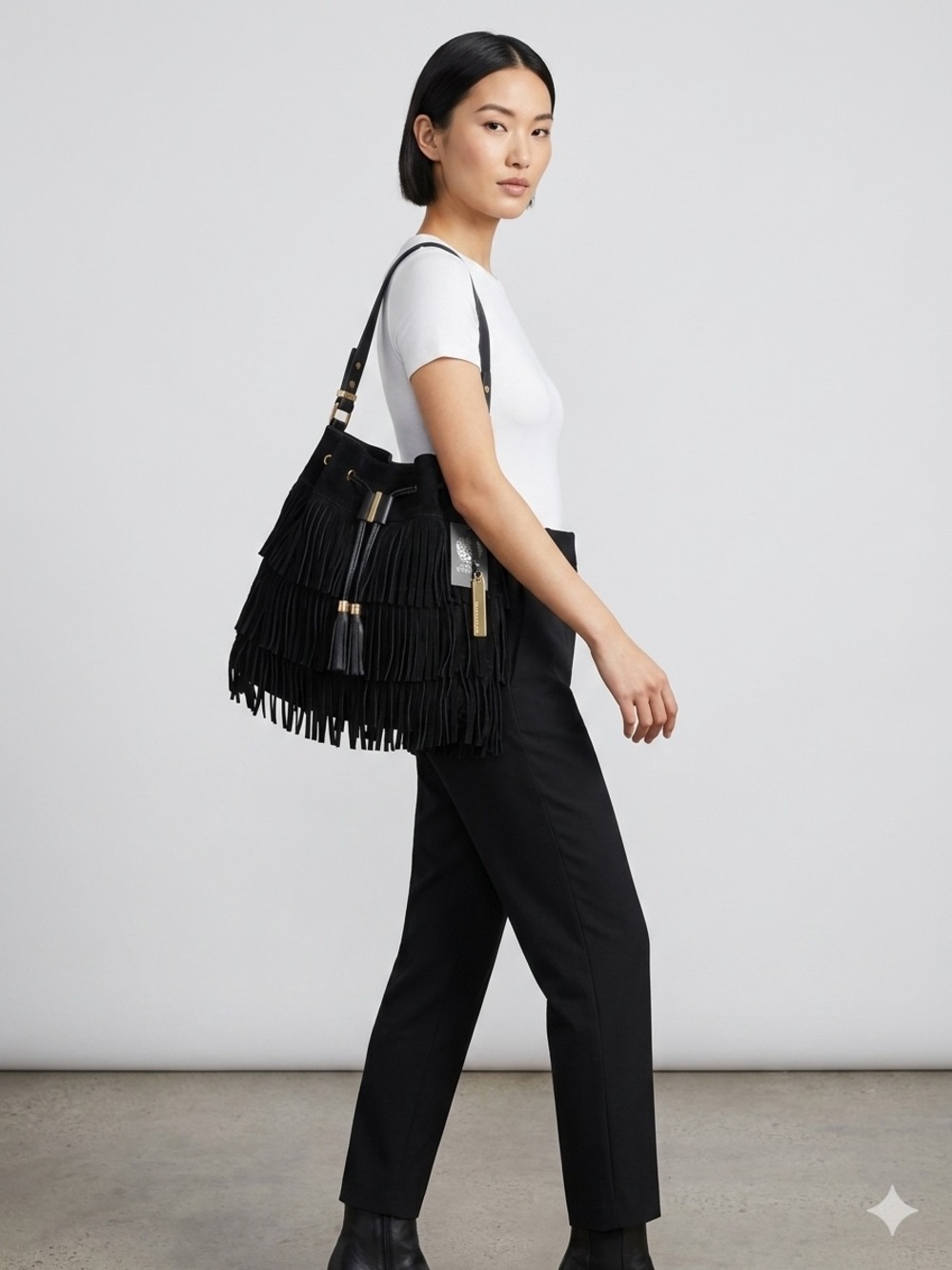 Vince Camuto Black Suede Fringe Bag with gold accents